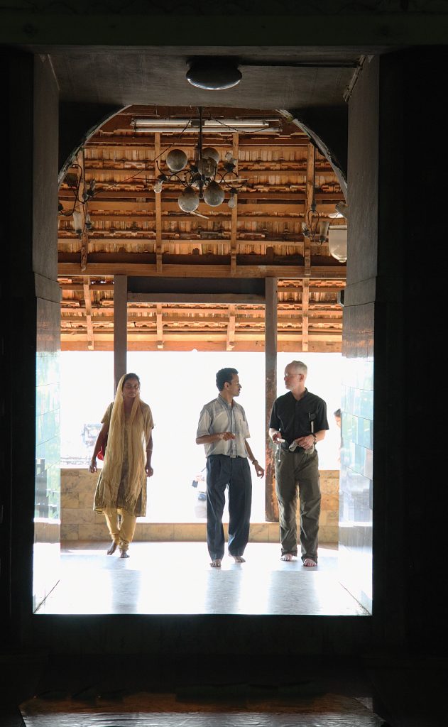 From left, Dr. Susan Thomas, Prof. István Perczel, and HMML Executive Director Fr. Columba Stewart, OSB, visit an historic church in Kerala